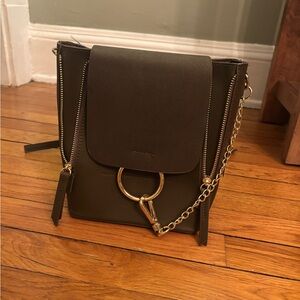 Francesca’s small olive back pack